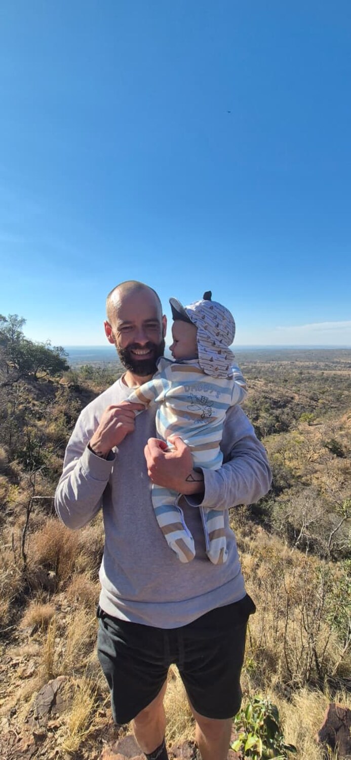 Guy Carosin with his son