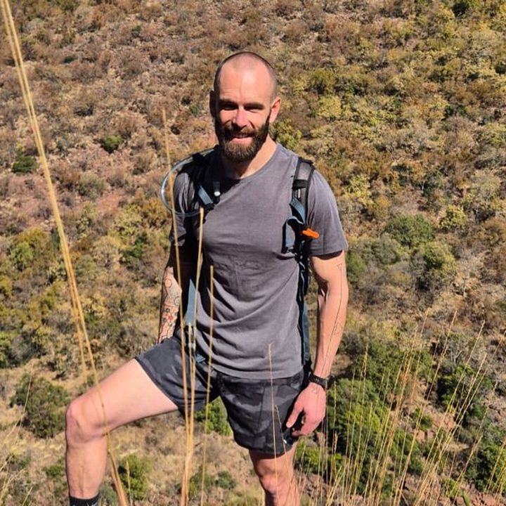 Guy Carosin hiking a trail outside Johannesburg